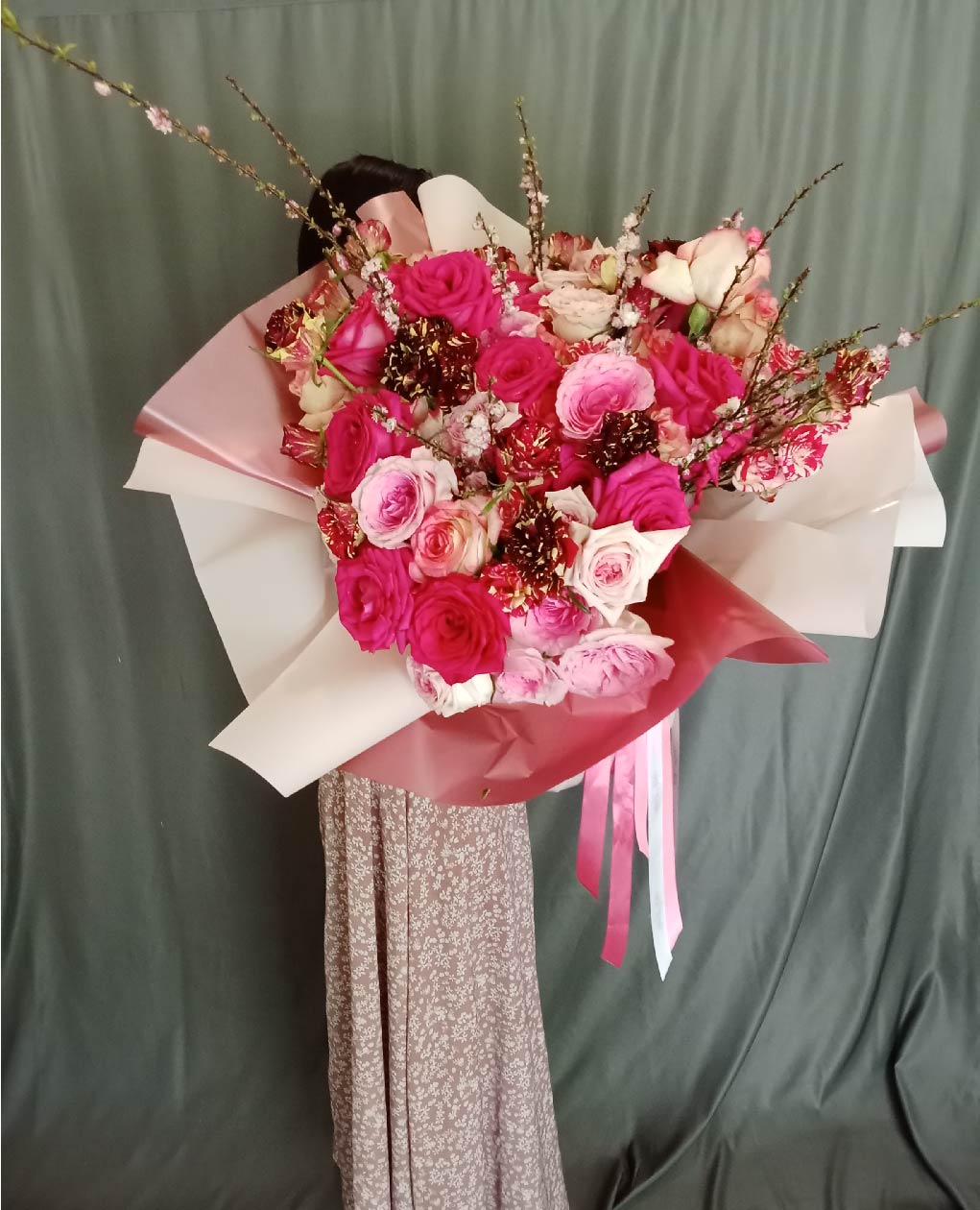 Stunning Cherry Blossom Bliss bouquet with pink and cream roses, peonies, and cherry blossoms, perfect for weddings and celebrations in Phuket.