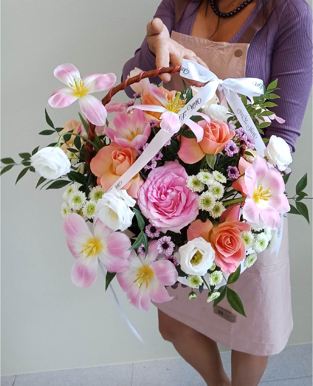 Romantic bouquet with pink roses, peach ranunculuses, and white chrysanthemums, perfect for special moments. Available for flower delivery in Phuket.